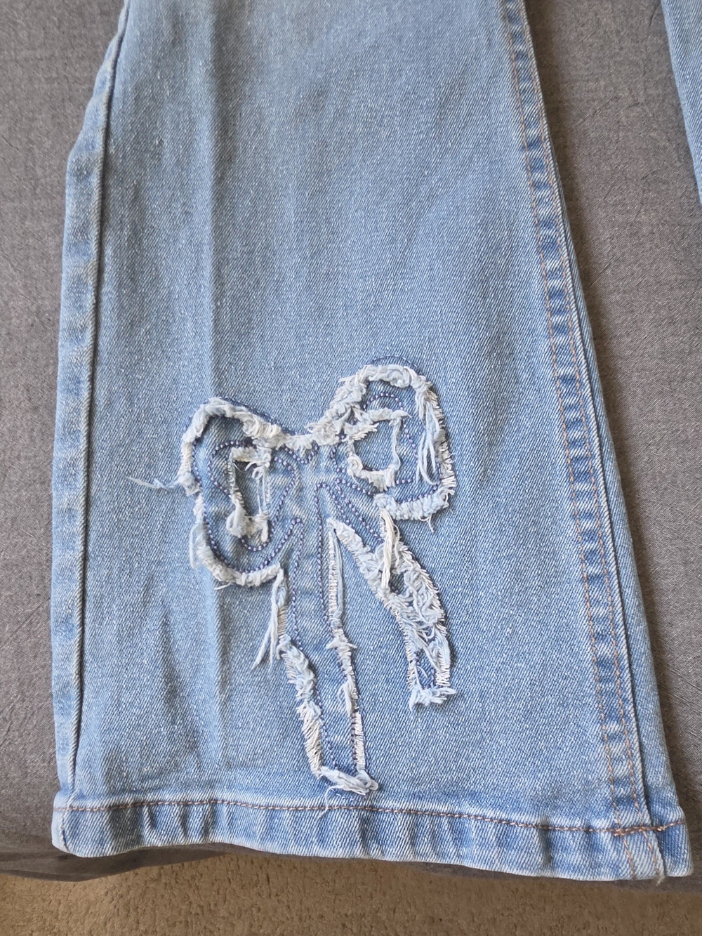 Jessica Simpson Light Blue Distressed Bow Jeans